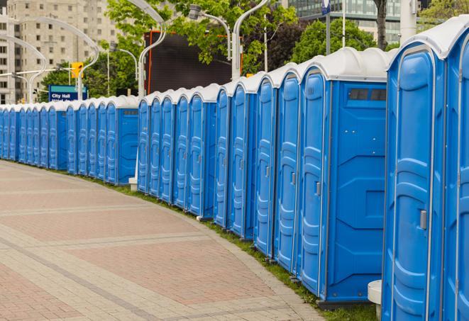 a row of portable restrooms at a fairground, offering visitors a clean and hassle-free experience in beaverton